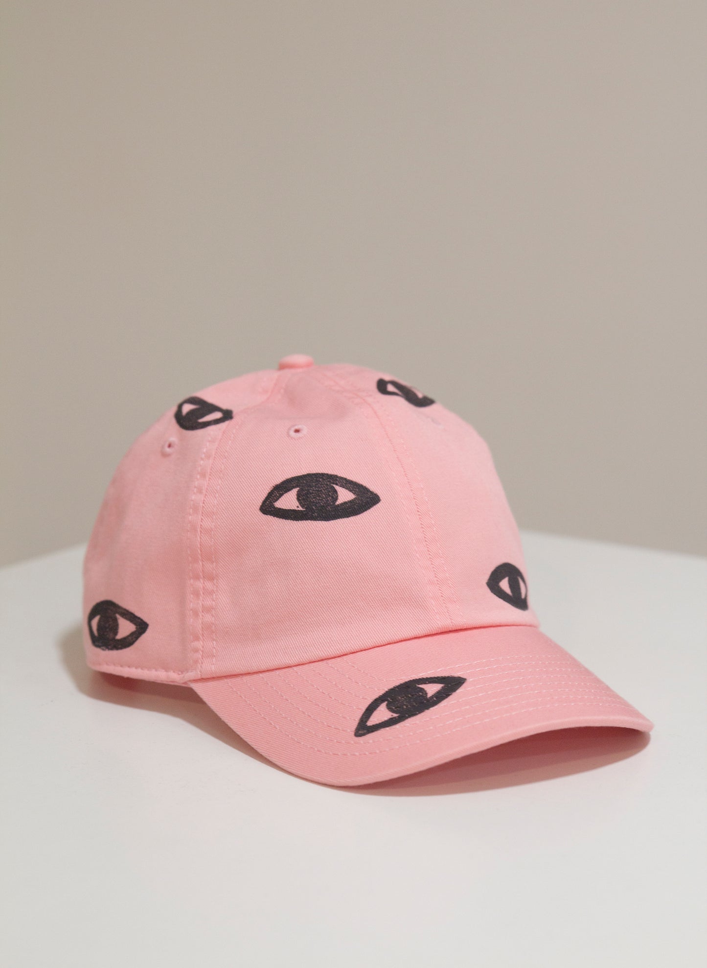 Gorra ojos color rosa