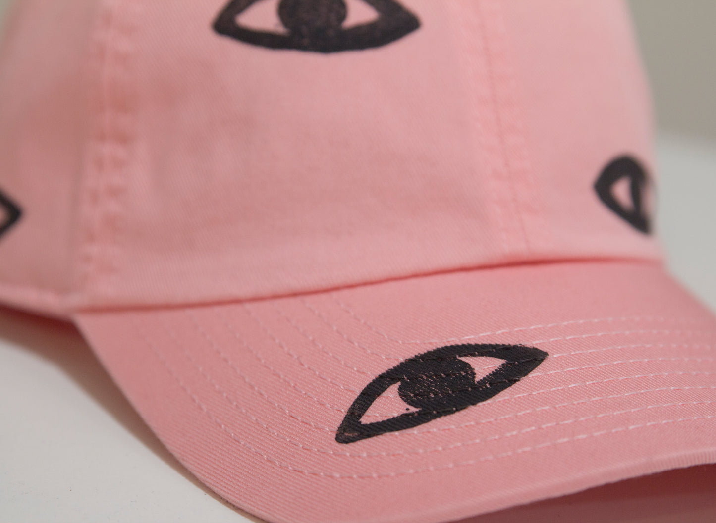 Gorra ojos color rosa