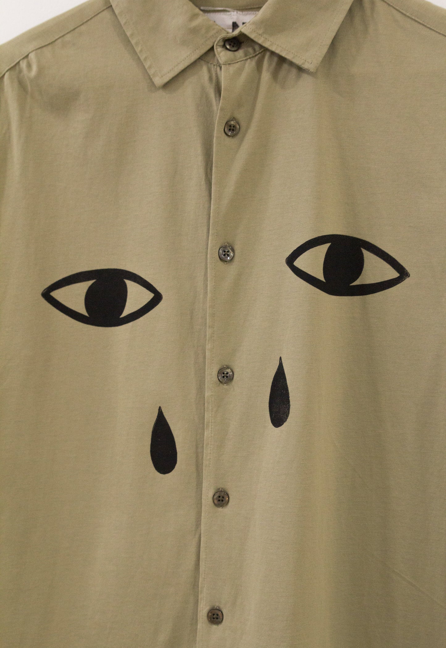 Camisa de algodón ojos